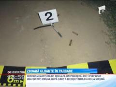 Masina ciuruita in parcarea unui supermaket aflat langa un poligon