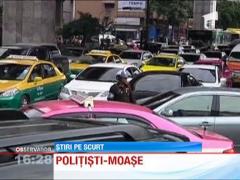 Politistii din capitala Thailandei, obligati sa faca cursuri de "moase" profesioniste