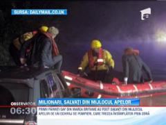 Primii parinti gay din Marea Britanie, salvati de pe capota masinii lor