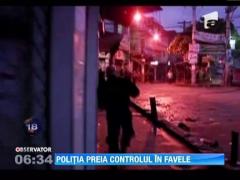 Politia braziliana a preluat controlul in doua dintre cele mai violente cartiere din Rio de Janeiro