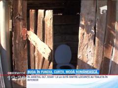 Romanii nu renunte la toaleta din fundul curtii