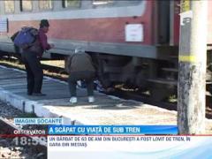 IMAGINI SOCANTE! A scapat cu viata de sub tren!