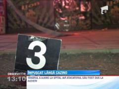 Tanar impuscat langa cazino