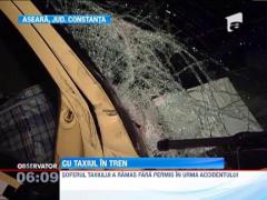 Cel mai norocos taximetrist din Constanta: a lovit un tren care transporta motorina si a scapat cu viata