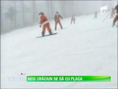 Mos Craciun se da cu placa de snowboard si schiaza ca un campion olimpic!