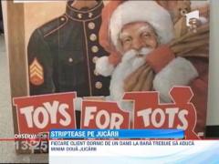 Un club de striptease din SUA ofera un dans la bara pentru orice client care vine si doneaza jucarii pentru copii