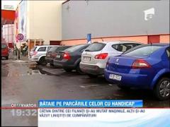 Bataie pe parcarile celor cu handicap