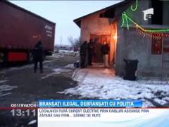 Mai multi locuitori ai unui sat din Arges furau curent prin intermediul sarmei de intins rufe