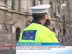 Un politist din Craiova a fost luat pe capota de un taximetrist! Soferul spune ca nu a mai putut opri masina