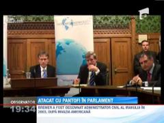 Atacat cu pantofi in Parlamentul britanic