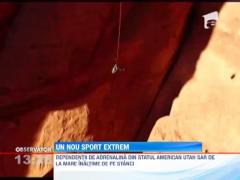 Un nou sport extrem: saritura cu coarda intre doua stanci abrupte