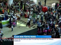 Peste 200 de copii au creat un flash mob ca o dedicatie muzicala pentru mamele lor