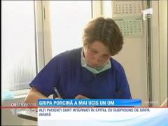 Gripa porcina a mai ucis un om