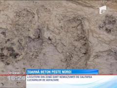 TREABA DE MANTUIALA: Asfaltul se toarna direct in noroi la Dej!