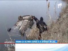 Doi barbati din Ialomita, gasiti morti intr-o masina cazuta in lac