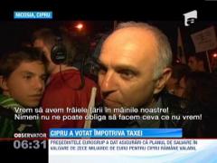 Cipriotii au sarbatorit decizia parlamentarilor de a respinge impozitul pe depozitele bancare