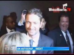 Gerard Butler i-a dat un autograf inedit unei fane: pe frunte, cu un marker permanent!