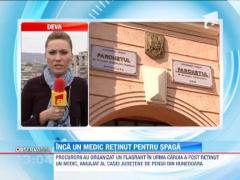 Inca un medic retinut pentru spaga