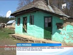 Patru barbati au dat foc grajdului unei familii pentru a le fura banii din casa