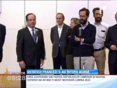 Sapte francezi luati ostatici de islamisti s-au intors acasa