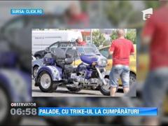 Cornel Palade merge la cumparaturi cu trike-ul