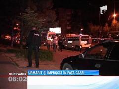 Urmarit si omorat cu sase focuri de arma, in fata blocului in care locuia