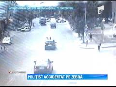 IMAGINI SOCANTE! Politist lovit pe trecerea de pietoni