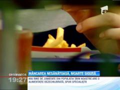 Opt din zece romani se imbolnavesc pentru ca mananca nesanatos