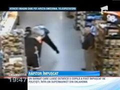 SUA: Un barbat care luase ostatica o copila a fost impuscat de politisti