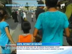 Un copil de origine palestiniana, retinut de soldatii israelieni pentru ca ar fi aruncat cu pietre
