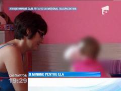 O copila cu o tumoare faciala, operata anul trecut, se lupta pentru viata