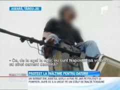 Un gorjean a protestat la inaltime pentru o datorie mai veche