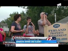 Fecioara Maria a aparut pe crucea din varful unei biserici!