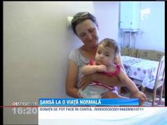 Sansa la o viata normala! O fetita care s-a nascut cu malformatii grave are nevoie de ajutor
