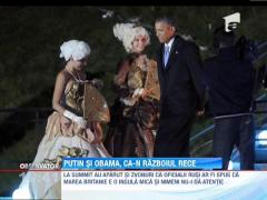 Strangeri de mana si zambete fortate intre Barack Obama si Vladimir Putin