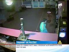 Politist filmat in timp ce fura dintr-un bar, dupa ce a pierdut toti banii la pacanele