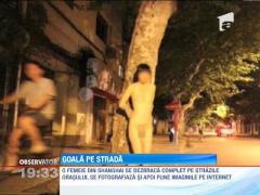 Goala pe strazile din Shanghai! O femeie le da batai de cap autoritatilor
