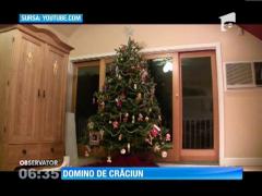 A aprins instalația bradului prin intermediul unui joc de domino