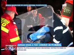 IMAGINI ŞOCANTE! Trupul pilotului Adrian Iovan a fost coborât de pe munte