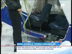 UPDATE / Epava avionului a fost tăiată în bucăţi şi dusă pe un platou