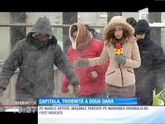 Cum arată Bucureştiul, blocat în nămeţi