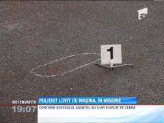 Poliţist lovit cu maşina pe trecerea de pietoni
