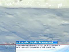 Atenţie! Brânza poate conţine urme de lapte!