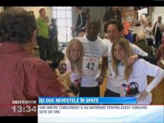 Sute de britanici îşi duc nevestele în spate