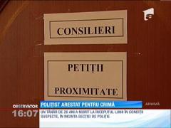 Un poliţist a fost arestat pentru crimă