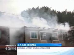 Un incendiu devastator a lăsat pe drumuri două familii cu opt copii