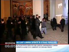 Lumina sfântă de la Mormântul lui Iisus a ajuns şi în inima Maramureşului