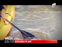 Stand-up paddle este un sport derivat din surf