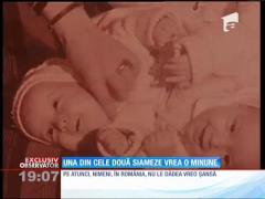Gherghina, una din cele două siameze, vrea o minune