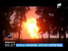 Putin şi Poroşenko negociază... pacea!